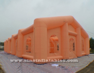 long orange inflatable rectangle tent